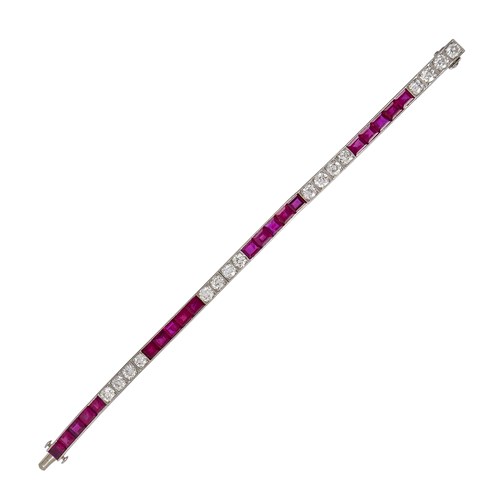 Art Deco diamond and ruby line bracelet by Marcus, New York c.1925, alternating groups of four and five stones,
